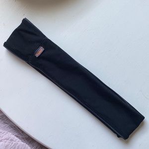 Runner’s FlipBelt store keys on hook, stash large I phone and AirPod case